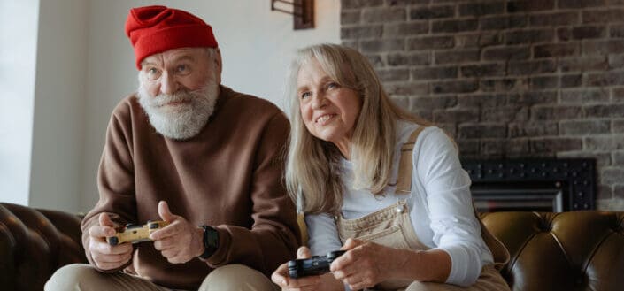 old couple playing video game