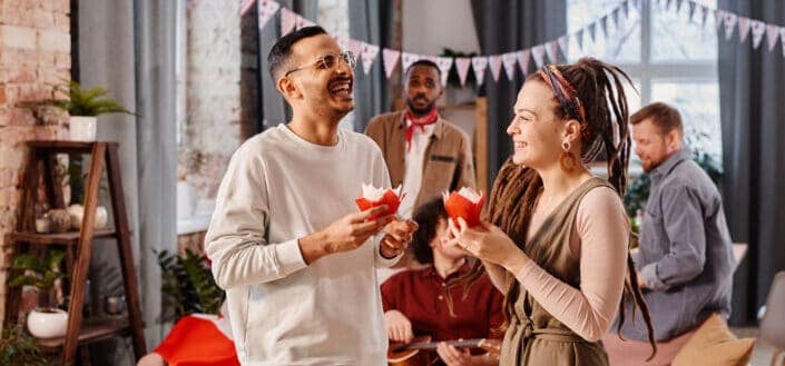 Man and woman laughing in party