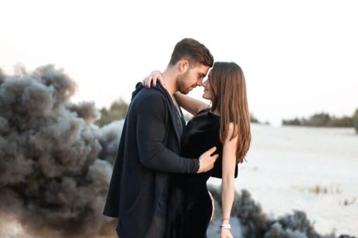 Couple having sweet moment near a seashore.