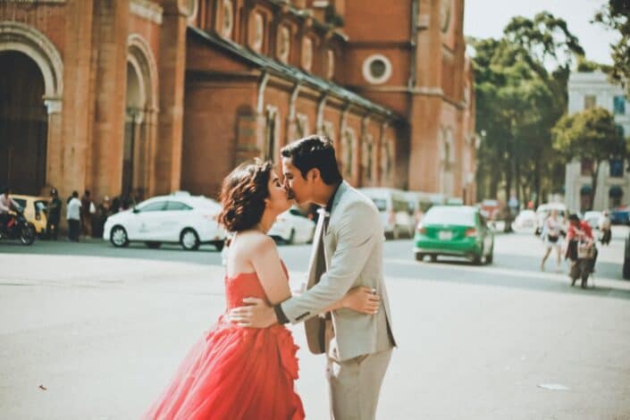 couple kissing in the street
