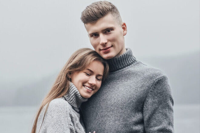 Couple wearing matching clothes hugging each other - gestures that make women melt