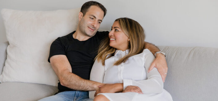 Man and woman lying on the couch