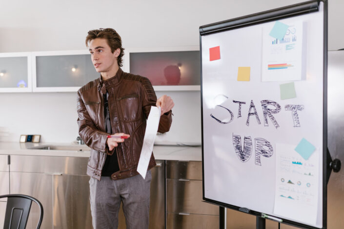 man doing a business presentation in a start up company