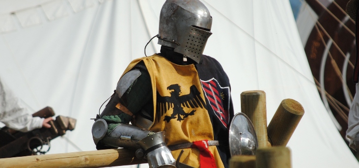 Man wearing a costume of a medieval knight