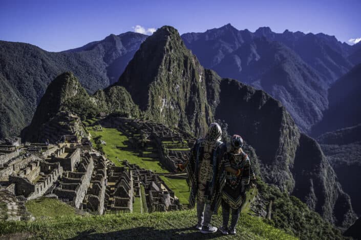 A couple looking at the machu picchu in peru