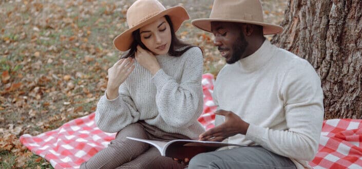 A couple reading magazine together
