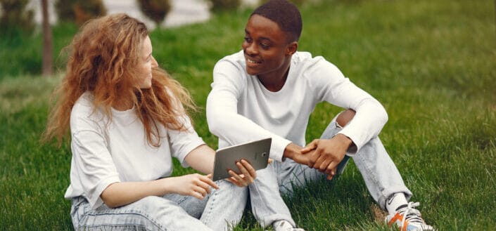 A couple smiling while looking at each other