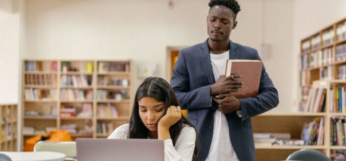 A teacher observing his student