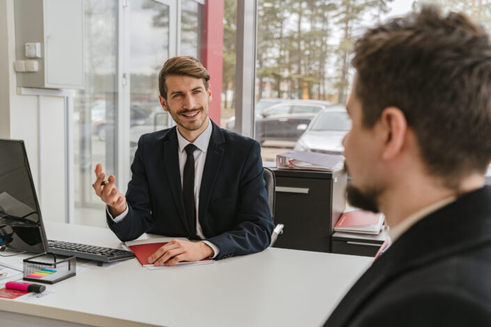 Businessman talking with client