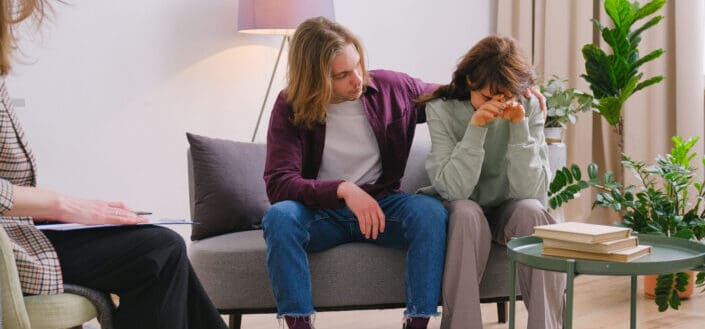 Couple discussing problems with psychologist