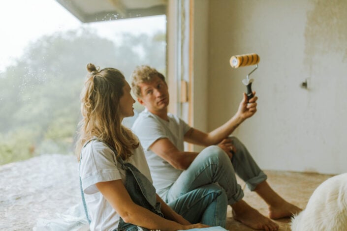 Man and Woman Renovating a House