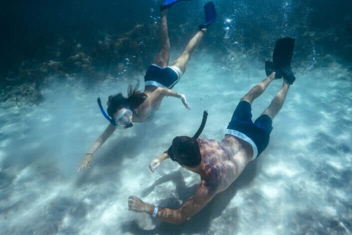 Man and woman snorkeling
