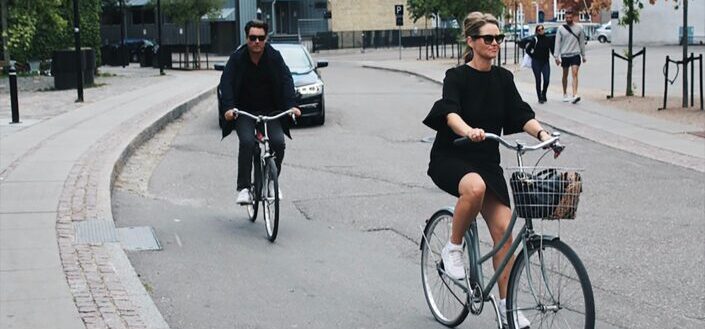 Man and Woman Riding Bicycles