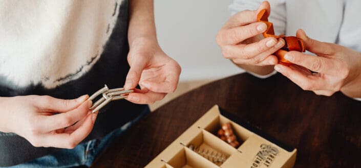 Two people trying to solve different puzzle puzzle