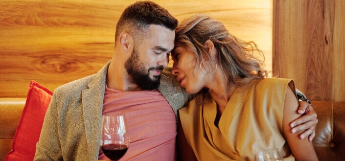 A loving couple drinking wine