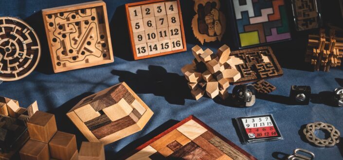brown wooden blocks on blue textile