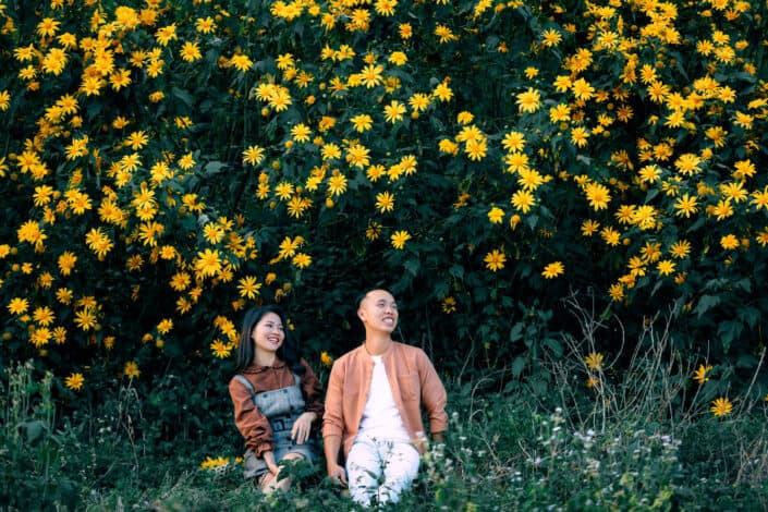 couple sitting on grass