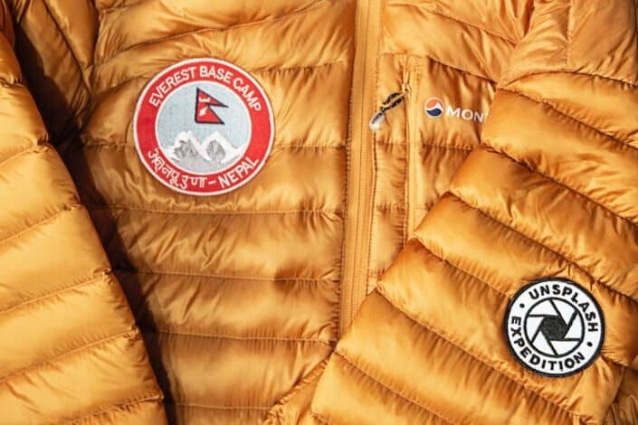 Orange winter blazer with Nepal and Everest base camp patches