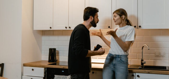 Couple arguing in the kitchen