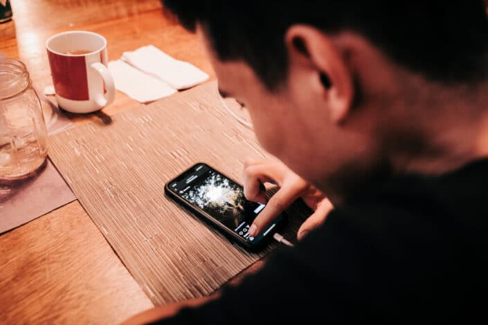 Man checking on his phone