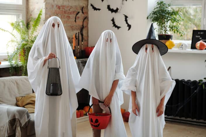 People in ghost costumes