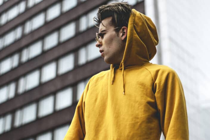 Photography of guy wearing yellow hoodie