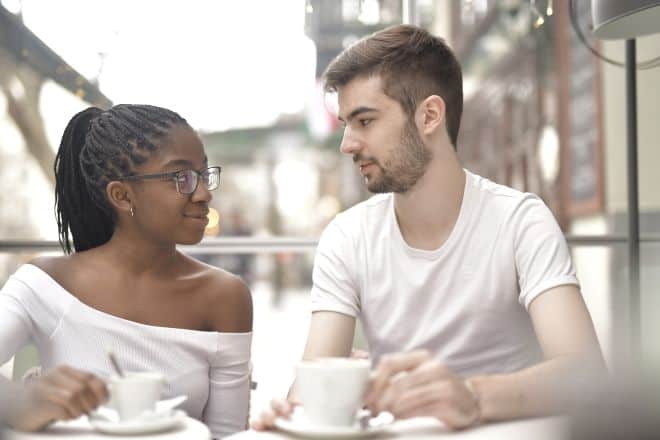 Couple Having Coffee Looking at Each Other - Spanish Pick-Up Lines