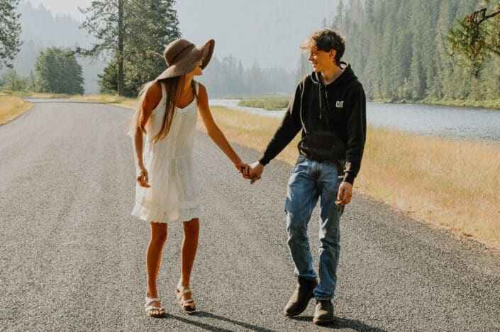 man and woman holding each others hand