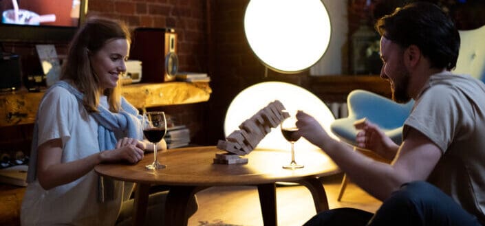 Couple playing wood blocks together