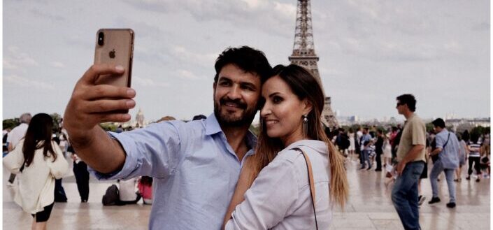 Couple Taking a Selfie With Eiffel Tower