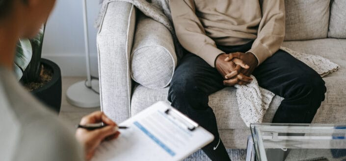 Client Discussing Problems With Psychologist