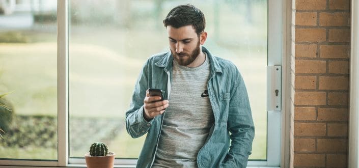 Person Using His Smartphone