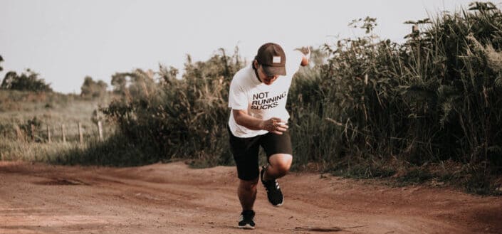 Man Running on Dirt Road