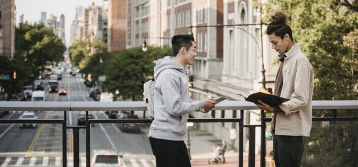 Students Studying For Exam on a Bridge