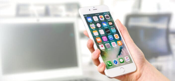 Person Holding Silver Phone