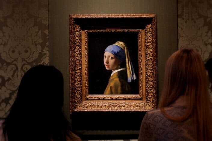 Women Admiring a Painting