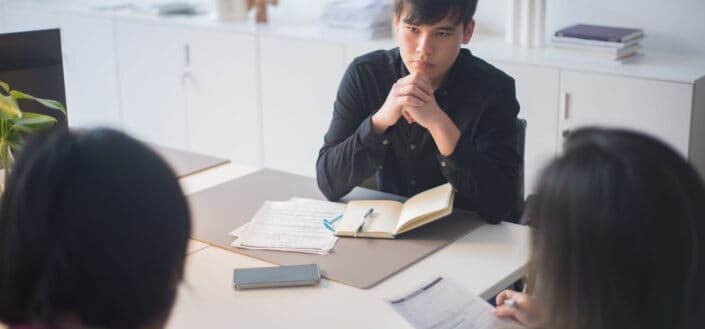 Employees Having a Meeting in the Office