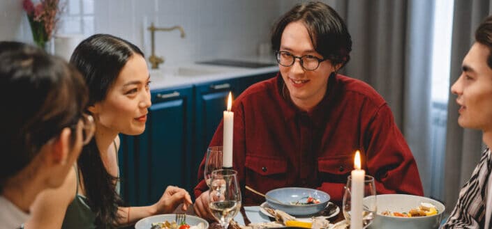 people having dinner together