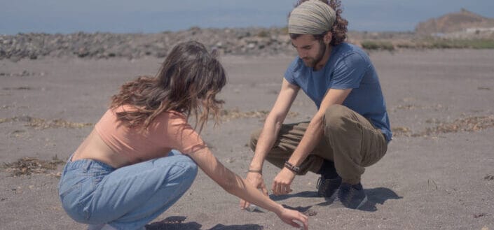 Lovely couple playing with sand