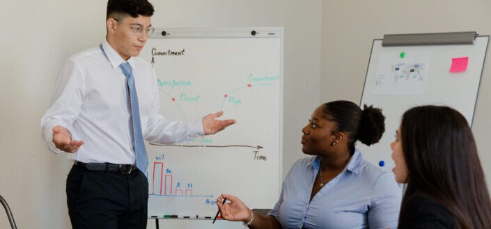 Man Presenting His Data to His Colleagues