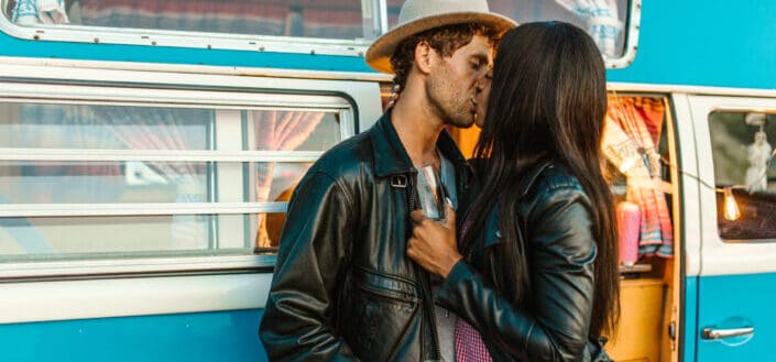 Couple in Leather Jackets Kissing