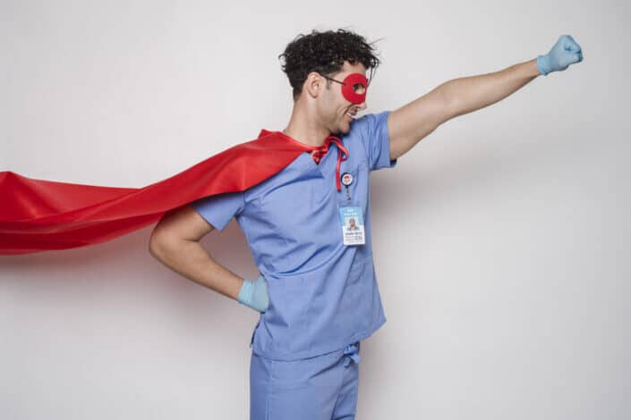 Positive doctor in red superhero costume