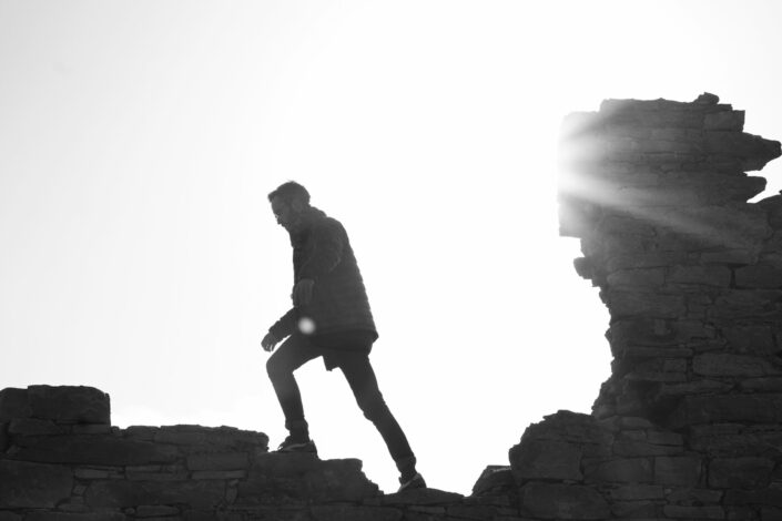 man walking on the wall