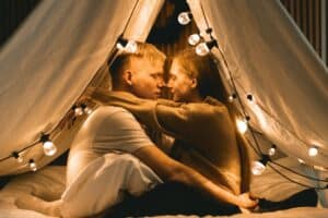 A couple inside a teepee - 5 Girl's Secrets Guys Don't Know