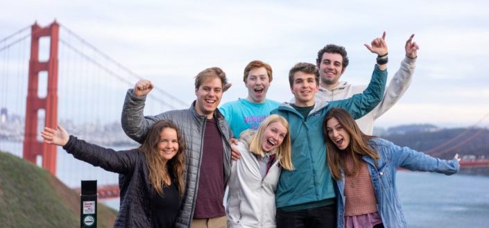 group of people posing for photo