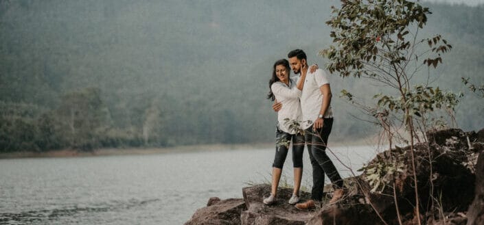 Couple Standing By a River