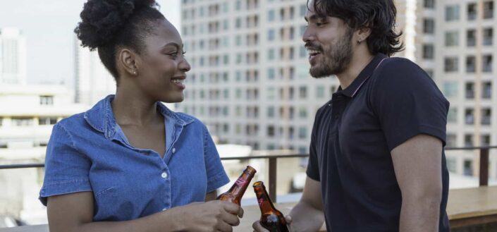 A man and woman facing each other while having conversation