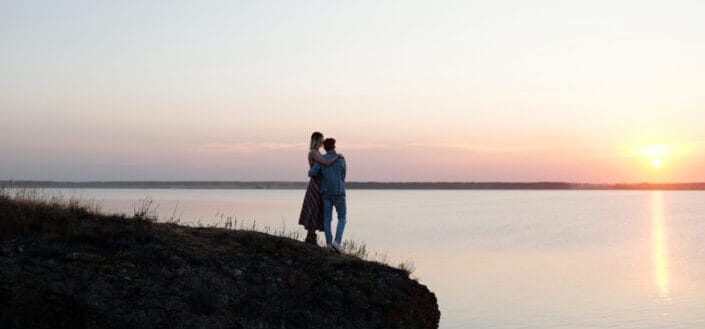 Romantic Couple Hugging Each Other During Sunset