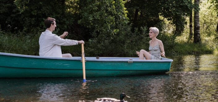 Romantic Couple Riding a Boat