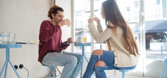 Woman and Man Eating Together